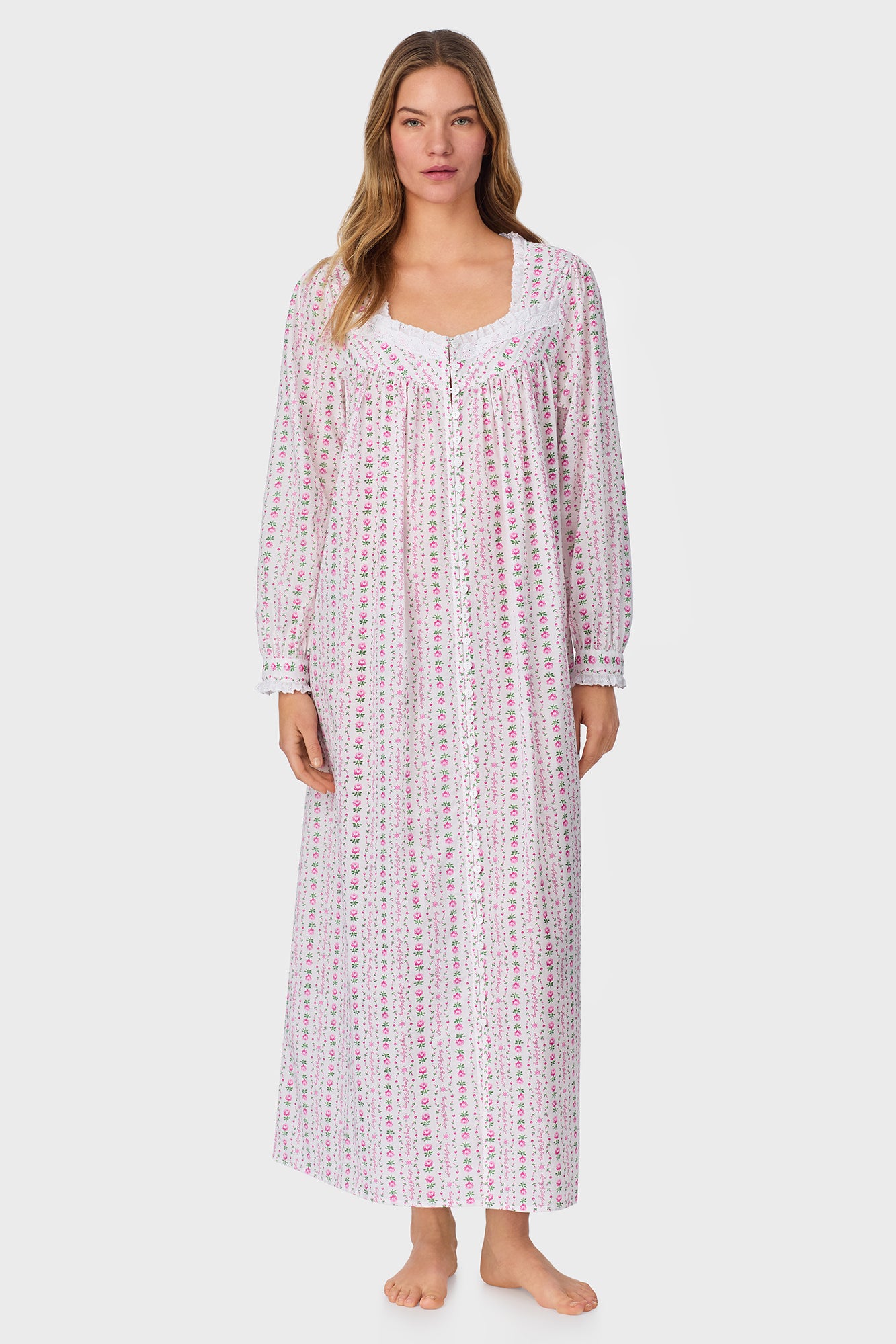 A lady wearing Rosey Tyrolean Cotton Lawn Ballet Button Front Robe