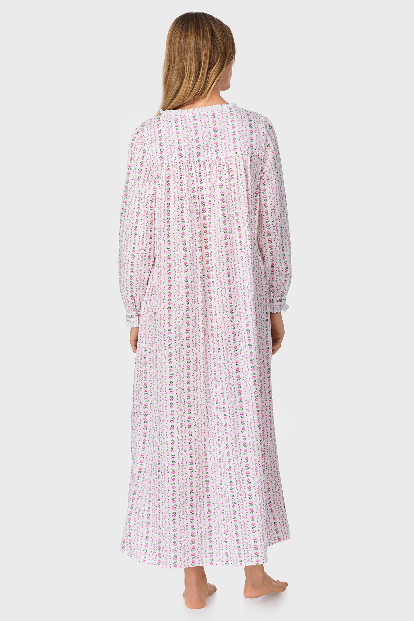 A lady wearing Rosey Tyrolean Cotton Lawn Ballet Button Front Robe
