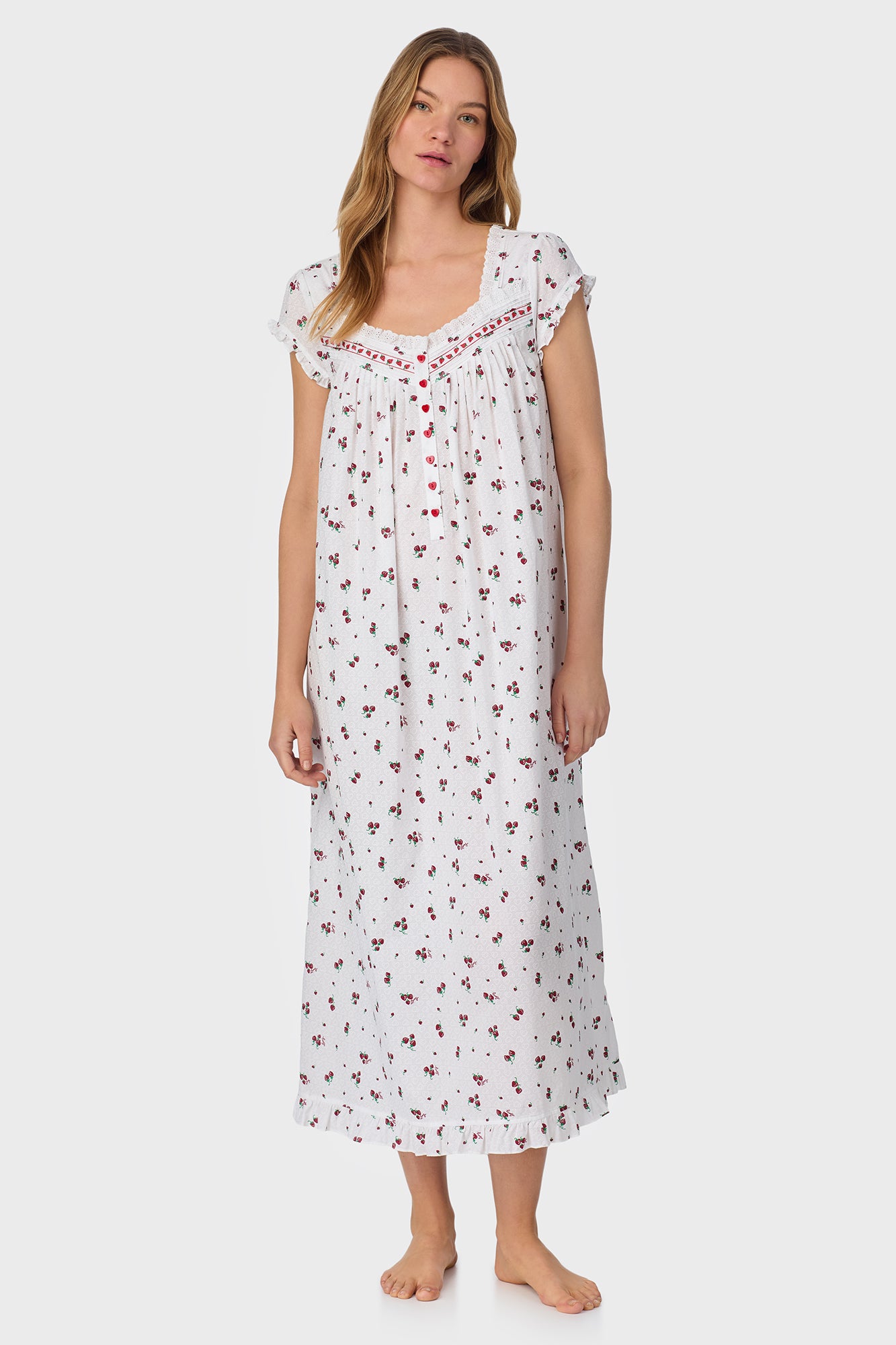 A lady wearing Strawberry Jubilee Cotton Lawn Cap Sleeve Long Nightgown