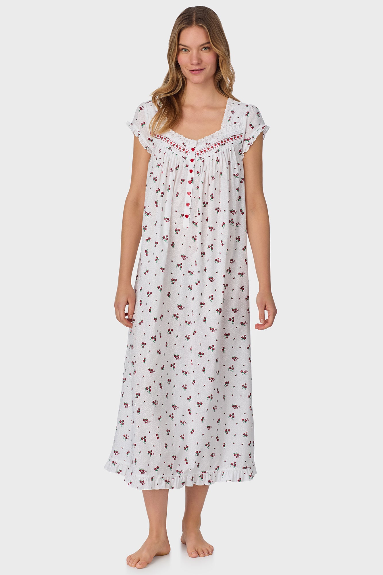A lady wearing Strawberry Jubilee Cotton Lawn Cap Sleeve Long Nightgown