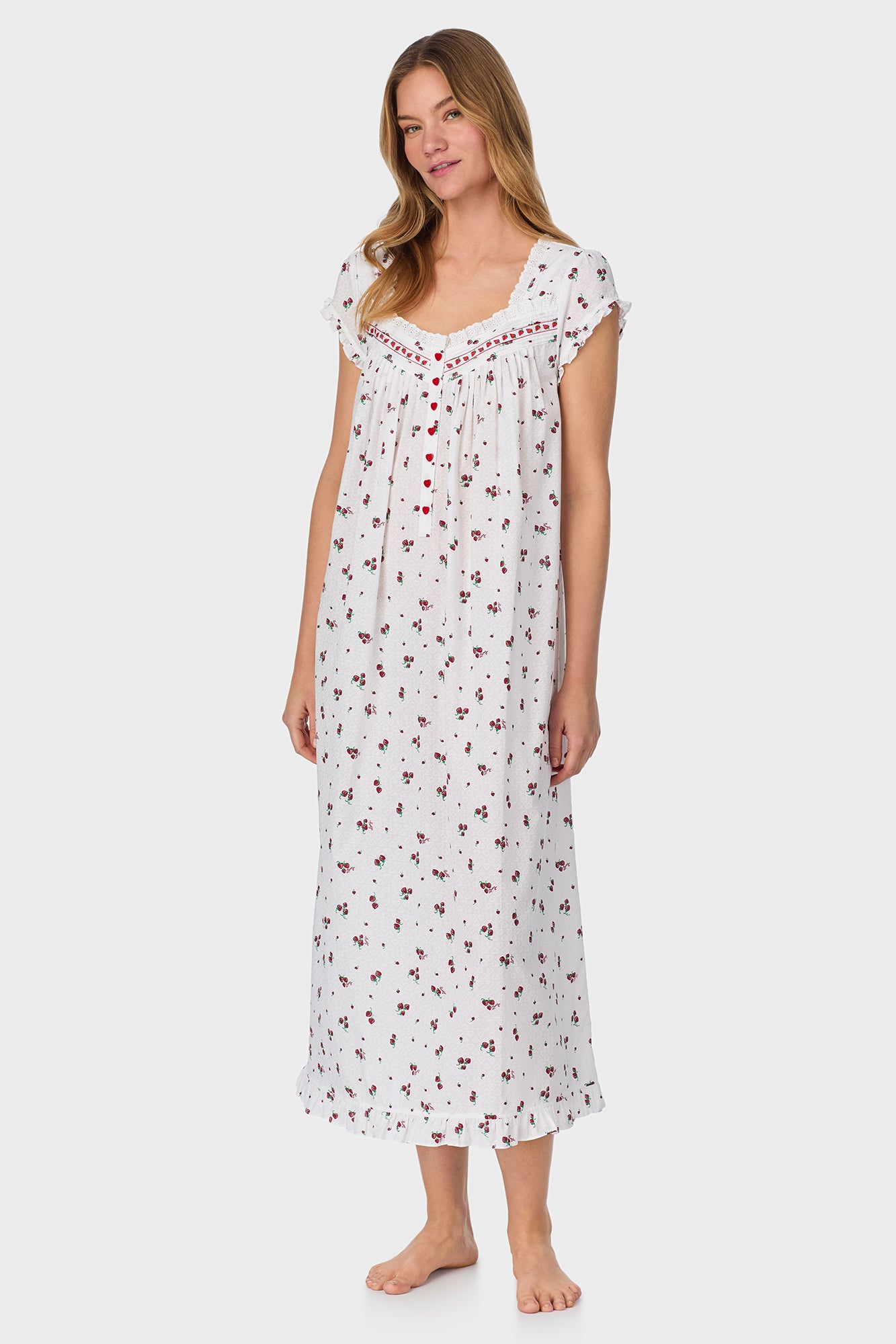 A lady wearing Strawberry Jubilee Cotton Lawn Cap Sleeve Long Nightgown