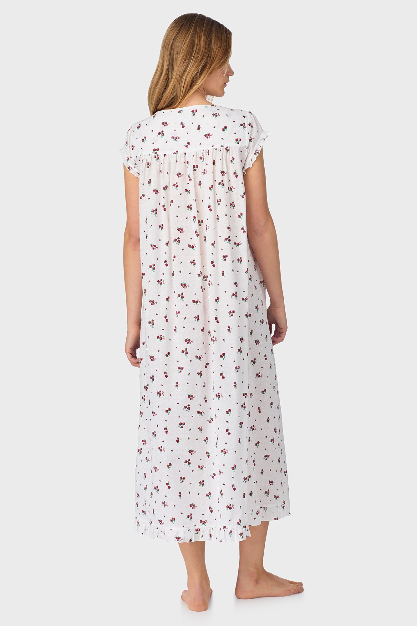 A lady wearing Strawberry Jubilee Cotton Lawn Cap Sleeve Long Nightgown