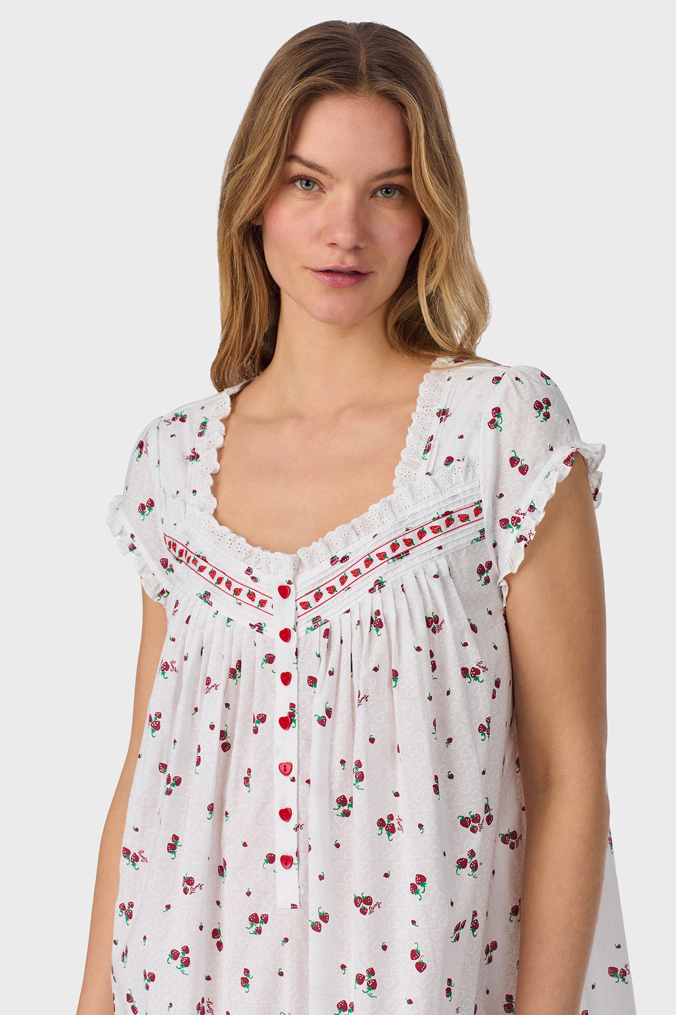 A lady wearing Strawberry Jubilee Cotton Lawn Cap Sleeve Long Nightgown