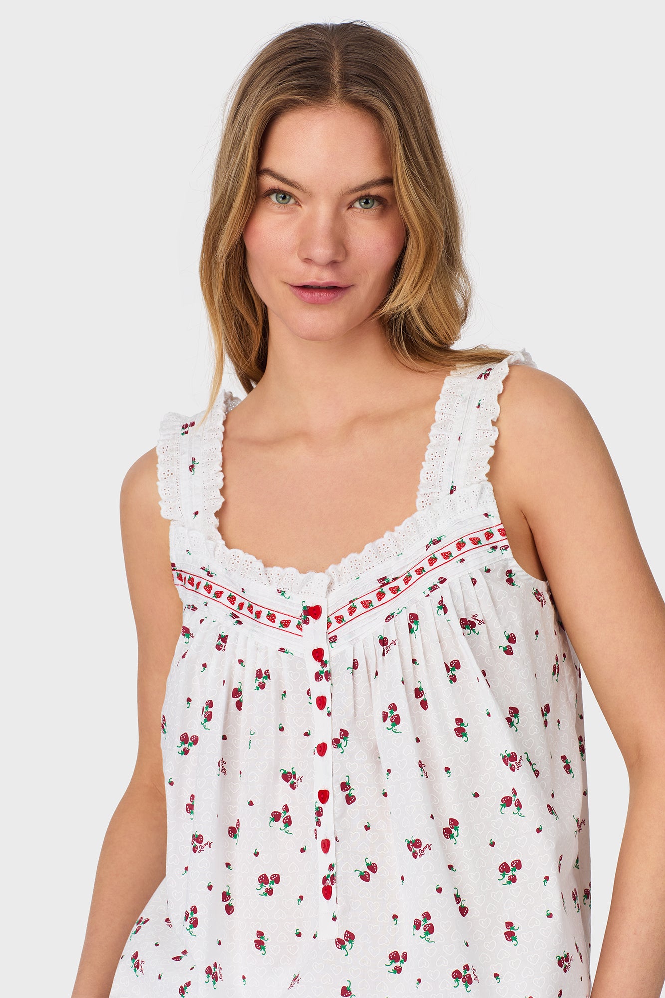 A lady wearing Strawberry Jubilee Cotton Lawn Capri Pajama